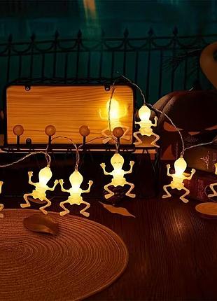 Світлодіодна гірлянда скелети на хелловін 1,5 м, 10 led фігурок, тепле біле світло, на батарейках нова