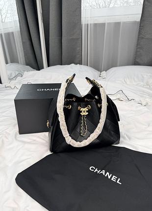 Chanel 25 small handbag in black caviar leather with gold hardware