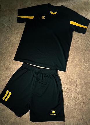 Футбольна форма kelme чорна з жовтими вставками, номер 11, розмір 160 см / eu 14 / 2xs