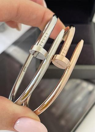 Гіпоалергенний позолочений браслет цвях з лого з медичної сталі (stainless steel)