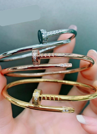 Гіпоалергенний позолочений браслет цвях з лого з медичної сталі (stainless steel)