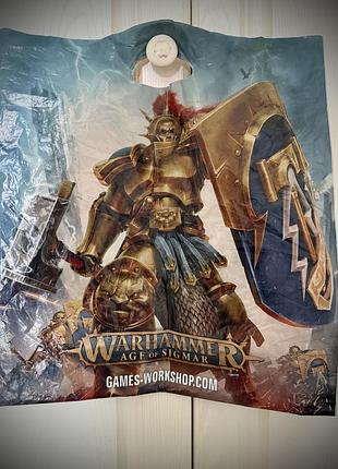 Вінтажний пакет warhammer age of sigmar и логотипом games workshop. stormcast eternals, постер.