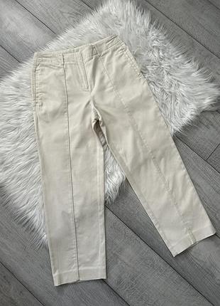 Вкорочені молочні жіночі брюки calvin klein