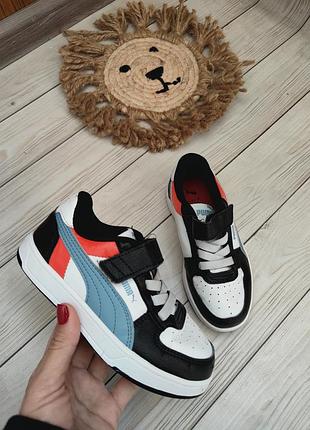 Кросівки дитячі puma чорно-білі з синіми та помаранчевими вставками