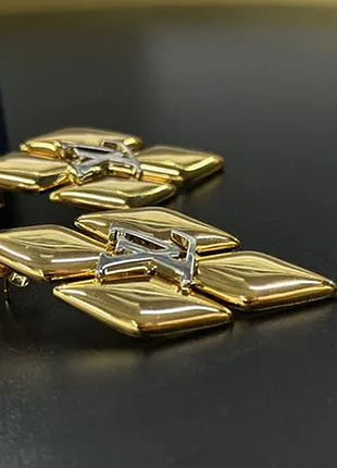 Сережки lv з медичної сталі (stainless steel) лимонна позолота, висока якість