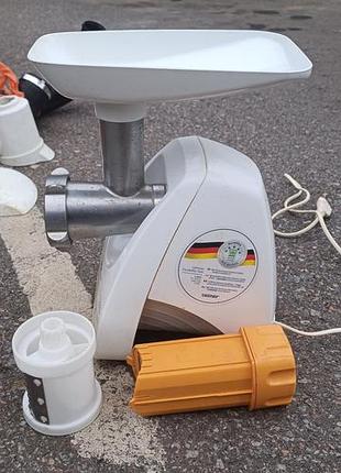 Электрическая мясорубка zelmer серии mm1200 (мощностью до 1900 вт) с насадкой-теркой.