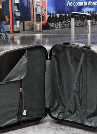 Дорожный пластиковый чемодан wings 310 на 4-х колесах. польша8 фото