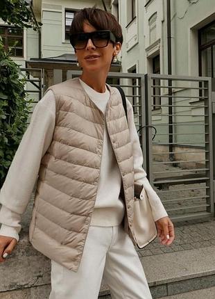 Женская пуховая жилетка uniqlo