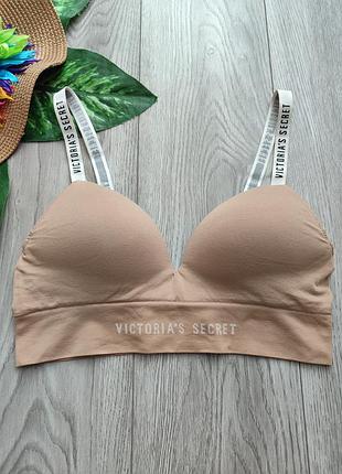 Бесшовный бежевый бюстгальтер без косточек из серии victoria’s secret bra с фирменными логотипами на бретелях и под грудью 75b размер s