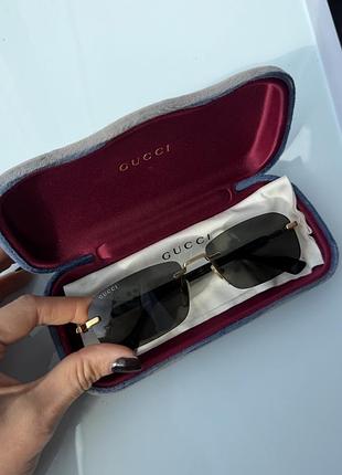 Сонцезахисні окуляри унісекс gucci із золотою оправою та сірими лінзами