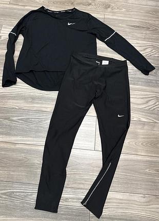 Оригінальні чорні спортивні лосіни nike розмір л
