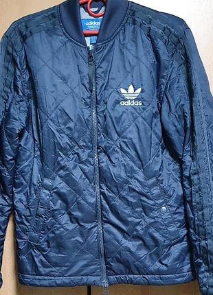 Оригигал.стьобаний курточка adidas