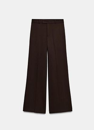 Коричневі брюки zara