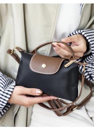Відома компактна жіноча сумка longchamp le pliage original pouch (або версія mini) у класичному чорному кольорі