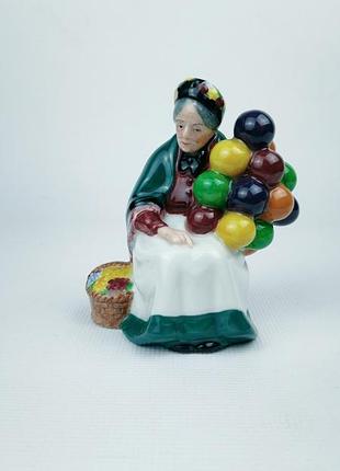 Коллекционная фарфоровая статуэтка royal doulton hn 2129 the old balloon seller (англия)