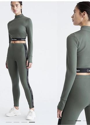 Очень классный стильный костюм calvin klein : лосины + топ