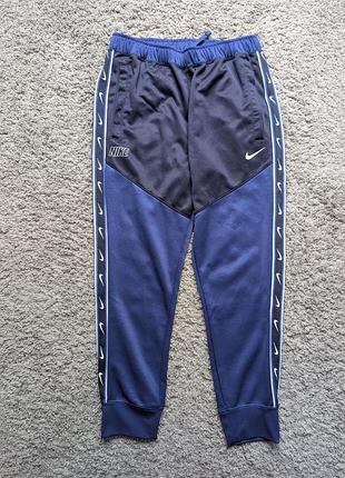 Штани nike на лампасах