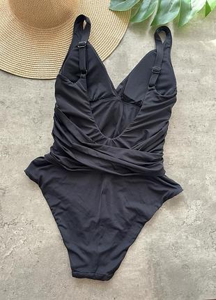 Чорний суцільний купальник calzedonia з відкритою спинкою