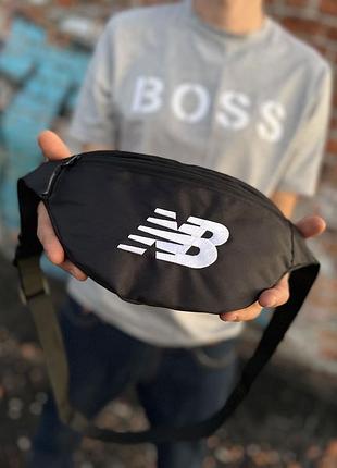 Чорна сумка new balance через плече, компактна чоловіча бананка 34×14 см