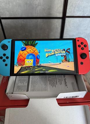 Nintendo switch oled  neon red/blue + 2 ігри (картриджі mario, губка боб) + чохол + перехідник для телевізора