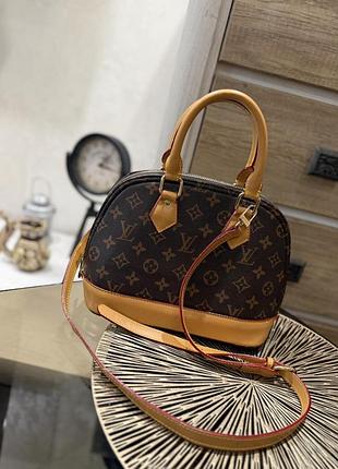 Сумка від бренду louis vuitton