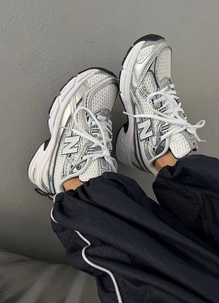 New balance 740
white / navy blue