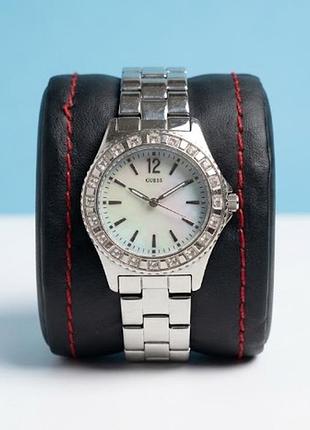 Элегантные женские наручные часы guess waterpro (модель g86149l) с перламутровым циферблатом и инкрустацией. водозащита: 100 meters (10 atm).