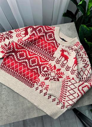 Светр бежевого кольору з акцентом dunnes
