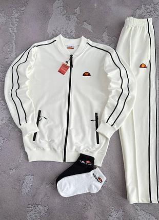 Костюм ellesse лампас: кофта-штани 2 пари шкарпеток у подарунок!   ціна костюма:  2350  грн  колір: чорний, молочний  розмір: s, m, l, xl, xxl