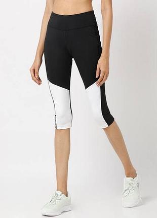 Жіночі спортивні капрі модель reebok wor color blocked capri