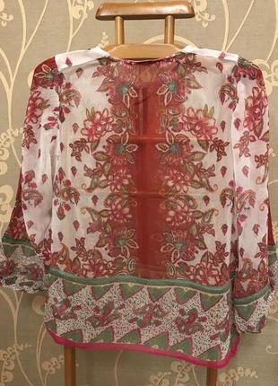 Очень красивая и стильная брендовая блузка в цветах..100% вискоза.2 фото