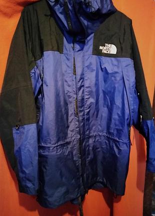 Куртка чоловіча the north face вітровка з капюшоном чорно-синя стан хороший, але повідривались з середини полоски яки закривають шви