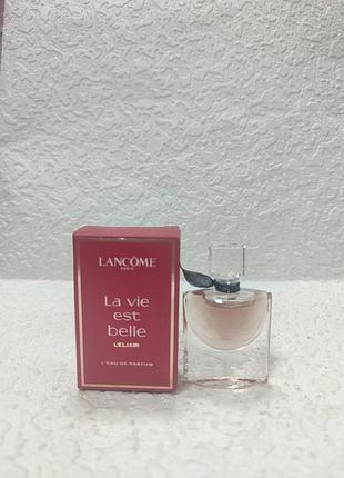 Жіноча парфумована вода lancôme la vie est belle l'elixir у червоній коробочці та з мініатюрним флаконом.4мл