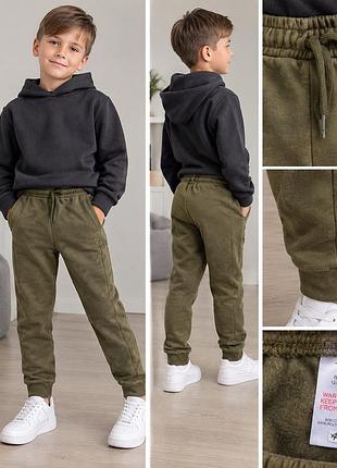 Спортивні штани оливкового кольору tu kids 128см