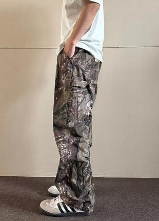 Штани джинсові розширені брюки "carhartt"лісовий камуфляж l