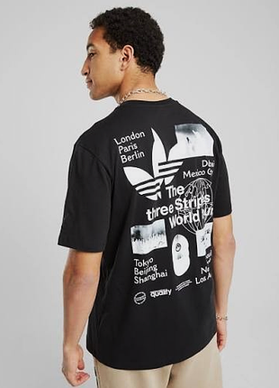 Футболка adidas originals the three stripes world tour.оригінал.