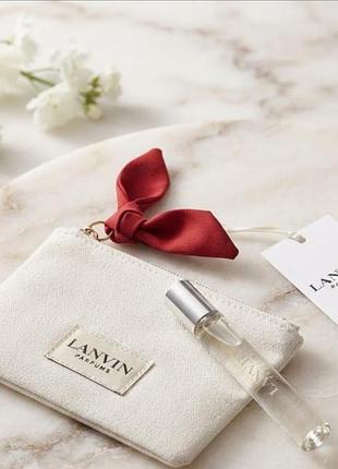 Фірмова біла косметичка  гаманець у пакуванні від бренду lanvin parfums. з парфумами modern princess 7,5ml