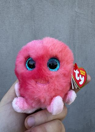 М'яку круглу іграшку-помпон «шелдон» (sheldon the coral octopus) у вигляді рожевого восьминога з блискучими блакитними очима від бренду ty