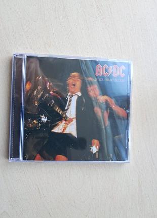 Компакт-диск (cd) з першим концертним альбомом австралійського рок-гурту ac/dc — «if you want blood you've got it».