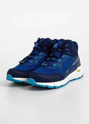 Дитячі трекінгові черевики trollkids kid's skarvan hiker mid xt синього кольору з водонепроникною мембраною та підошвою vibram.