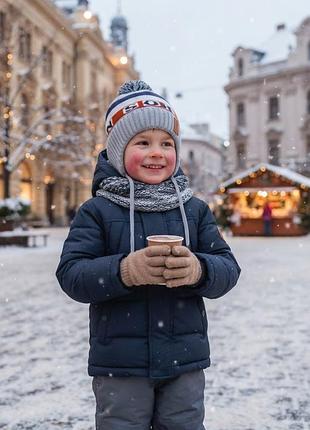 Шапка на хлопця з акрілу, на зав'язках,на зиму та осінь.