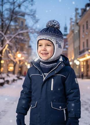 Шлем на парня из акрила на подкладке из трикотажа, на осень и зиму.