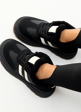 Чорні зимові утеплені кросівки на хутрі