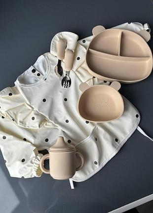 Детский передник слюнявчик из эко-кожи горошок чорний
