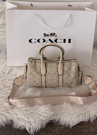 Женская сумка coach compass bag 25 crossbody in signature кремовый