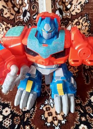 Трансформер оптимізований прайм playskool heroes transformers rescue bots optimus primal figure оптимус прайм трансформер динозавр европа