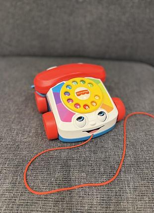 Іграшка-каталка fisher-price веселий телефон різнокольоровий