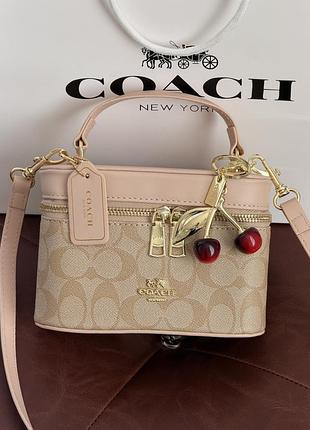 Сумка coach rainer crossbody bag 18 in signature canvas светло-бежевый