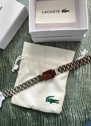 Мужской браслет lacoste - плетеный, серебристый с вставкой золотого цвета, нержавеющая сталь