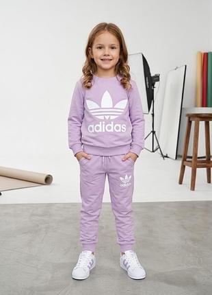 Дитячий спортивний костюм adidas (світшот і штани), бузковий 104-110